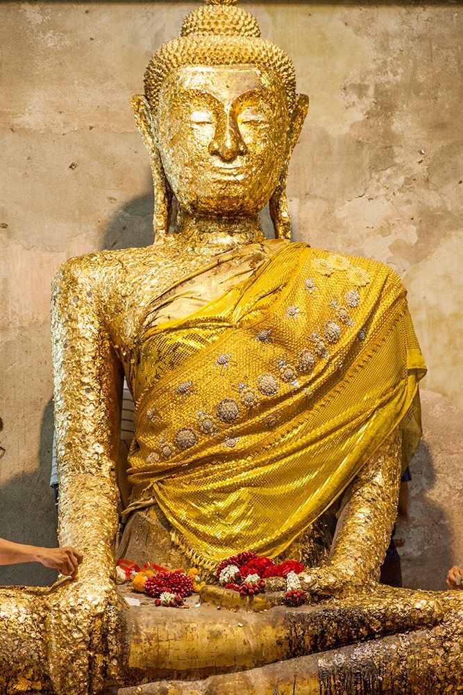 Thailand-Samut Songkhram Province-Amphawa District Buddha statue covered with gold leaf offerings